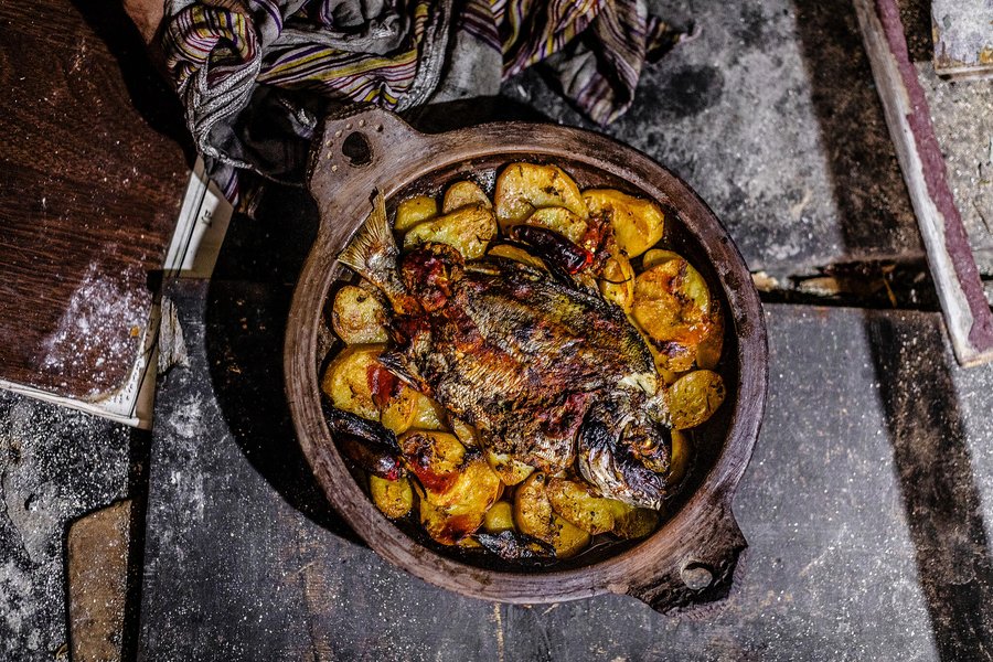 Wood fired fish with potatoes.