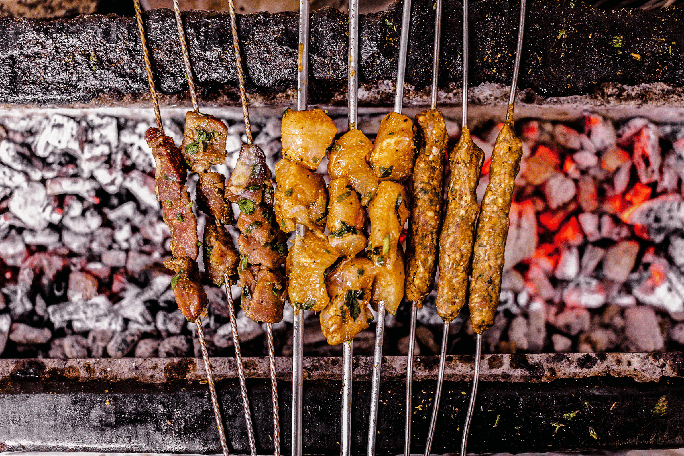 Skewers on charcoal.