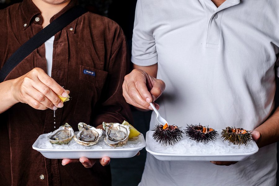 Shucks oysters and urchins.