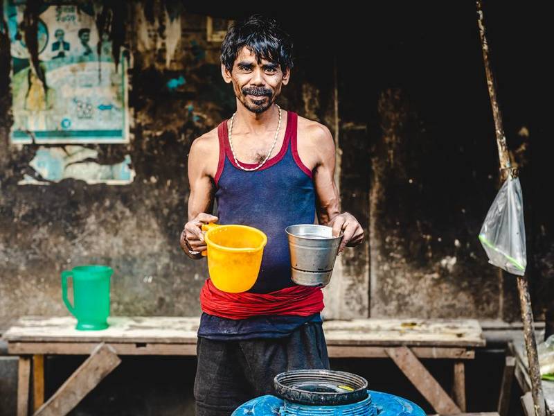 Milkman with buckets.