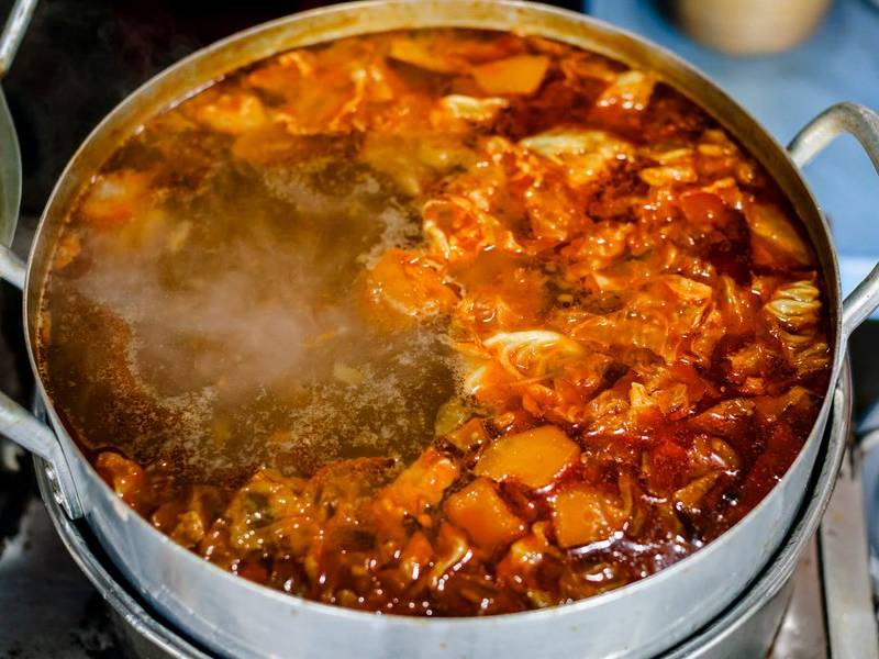 Simmering bún chả cá.