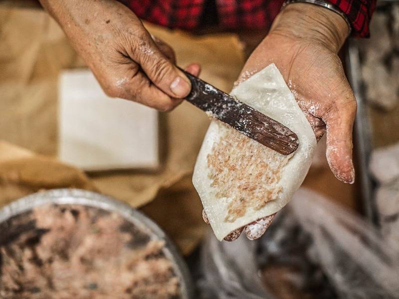 Filling dumplings.