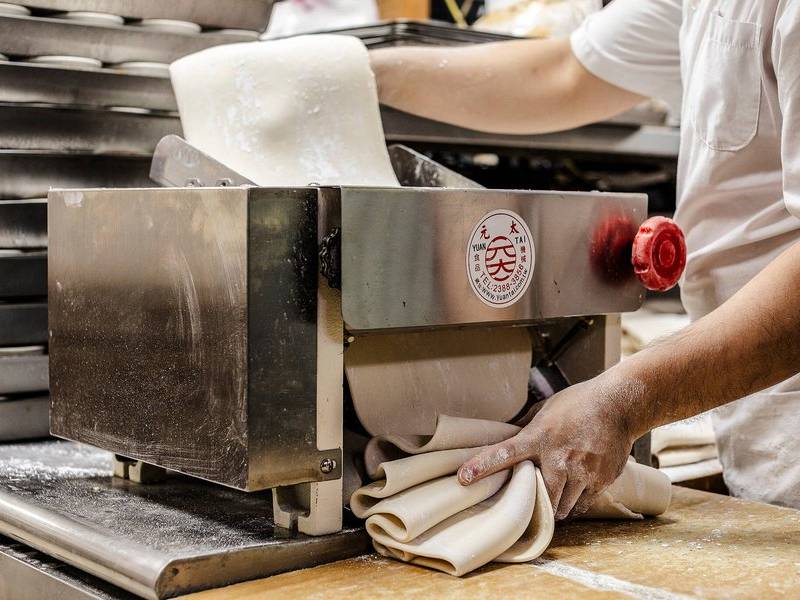 Rolling noodles.