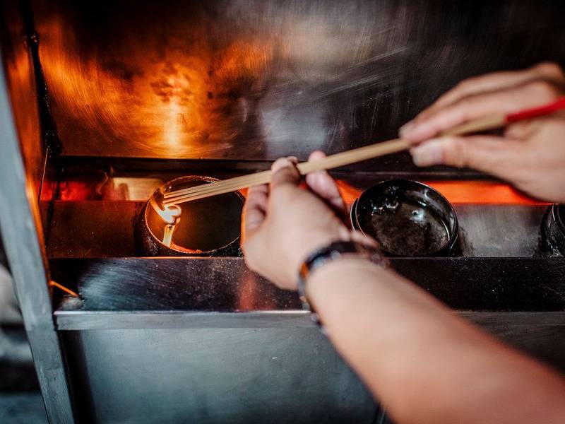 Lighting incense.