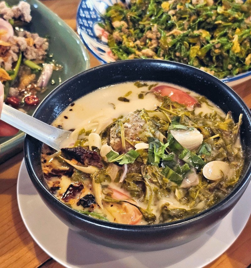 Coconut soup with gourami fish.