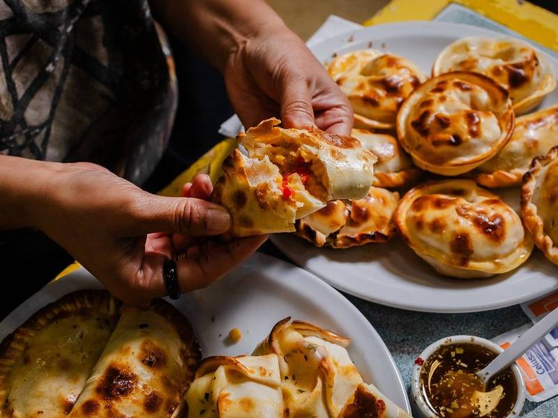 Empanada cheese pull.