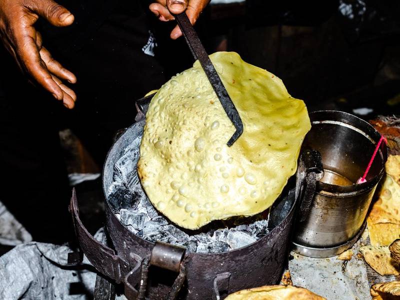 Papadum on coals.