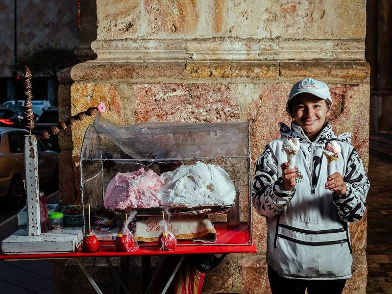 Proud street vendor.