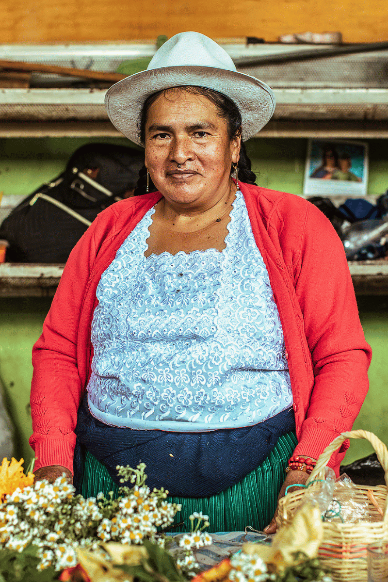 Market vendor with panama hat.