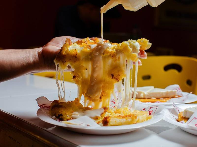 Arepa cheese pull.