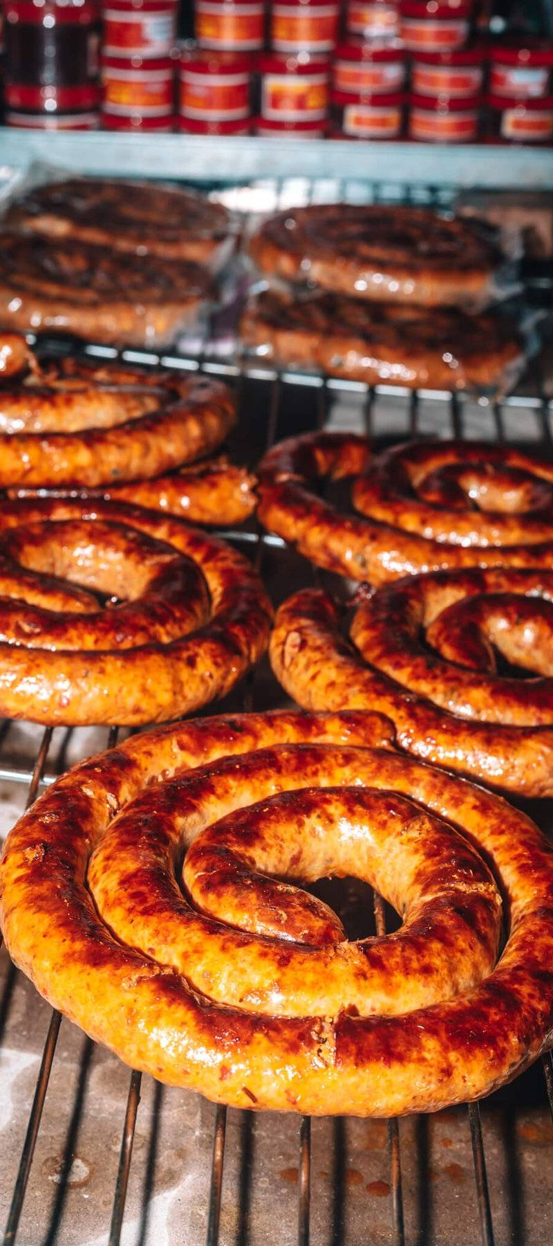 Grilling sai oua sausage.