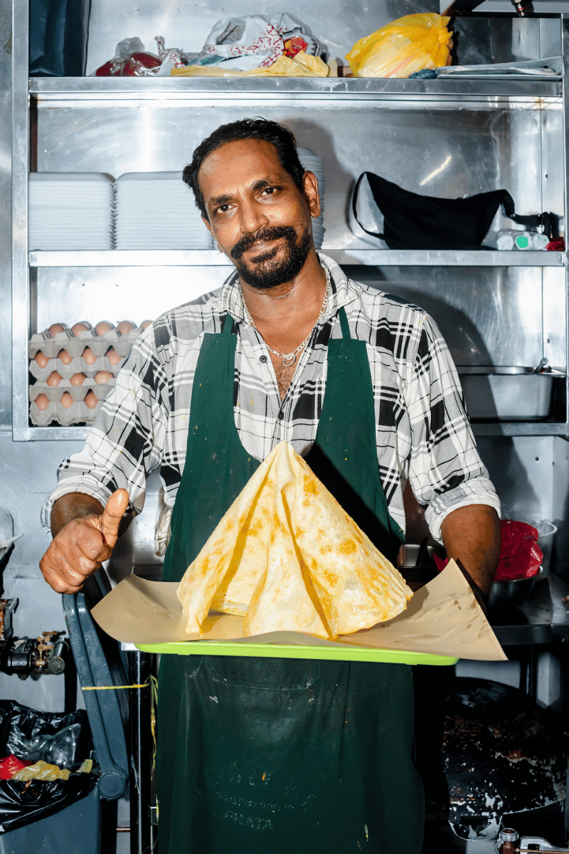Roti prata cook.