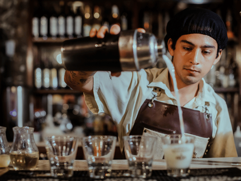 Making pisco sours.