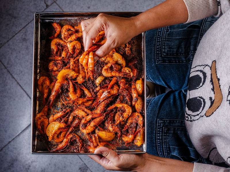 Tray of grilled shrimp.