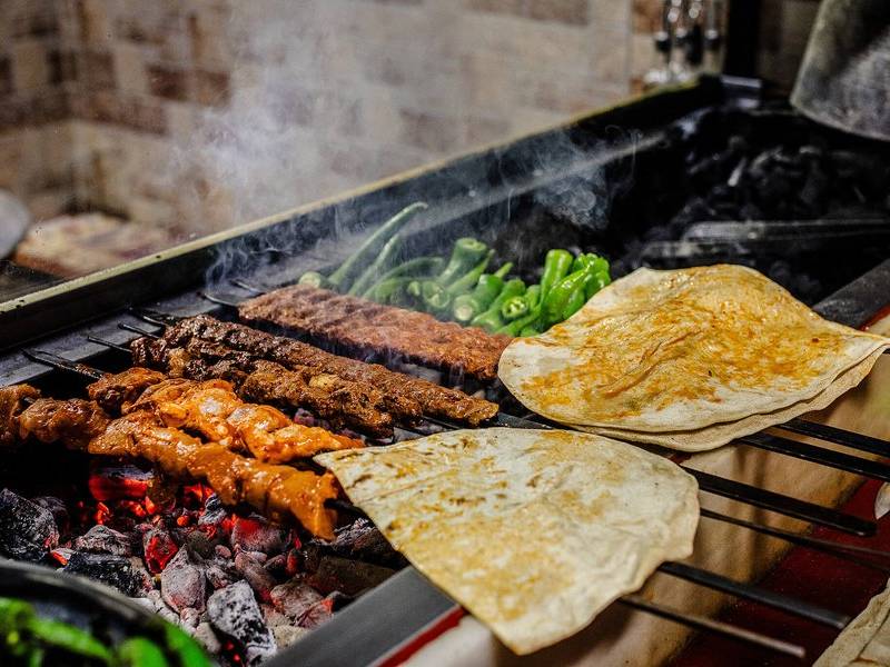 Skewers on coals.