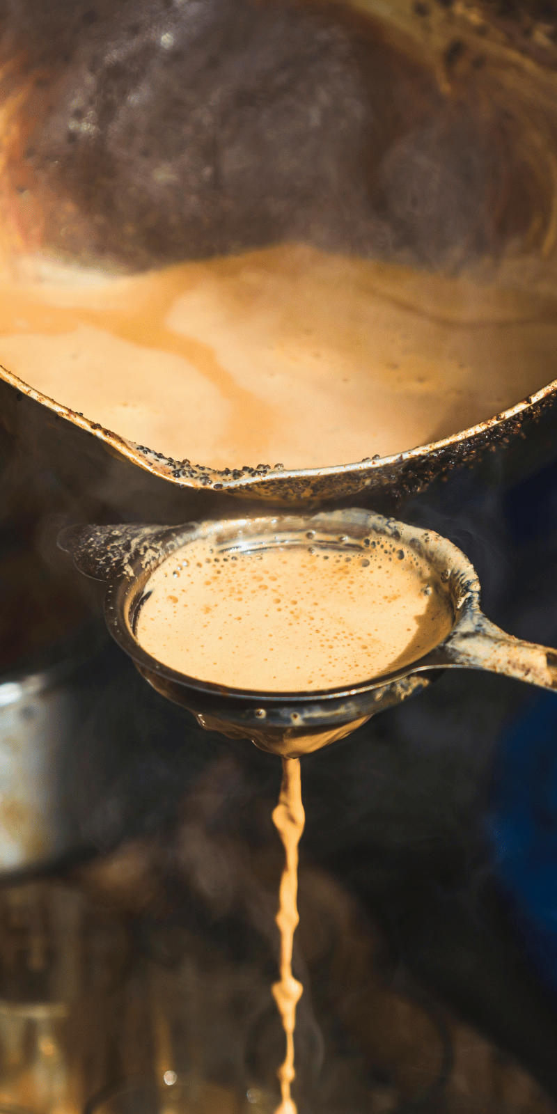 Straining fresh chai.