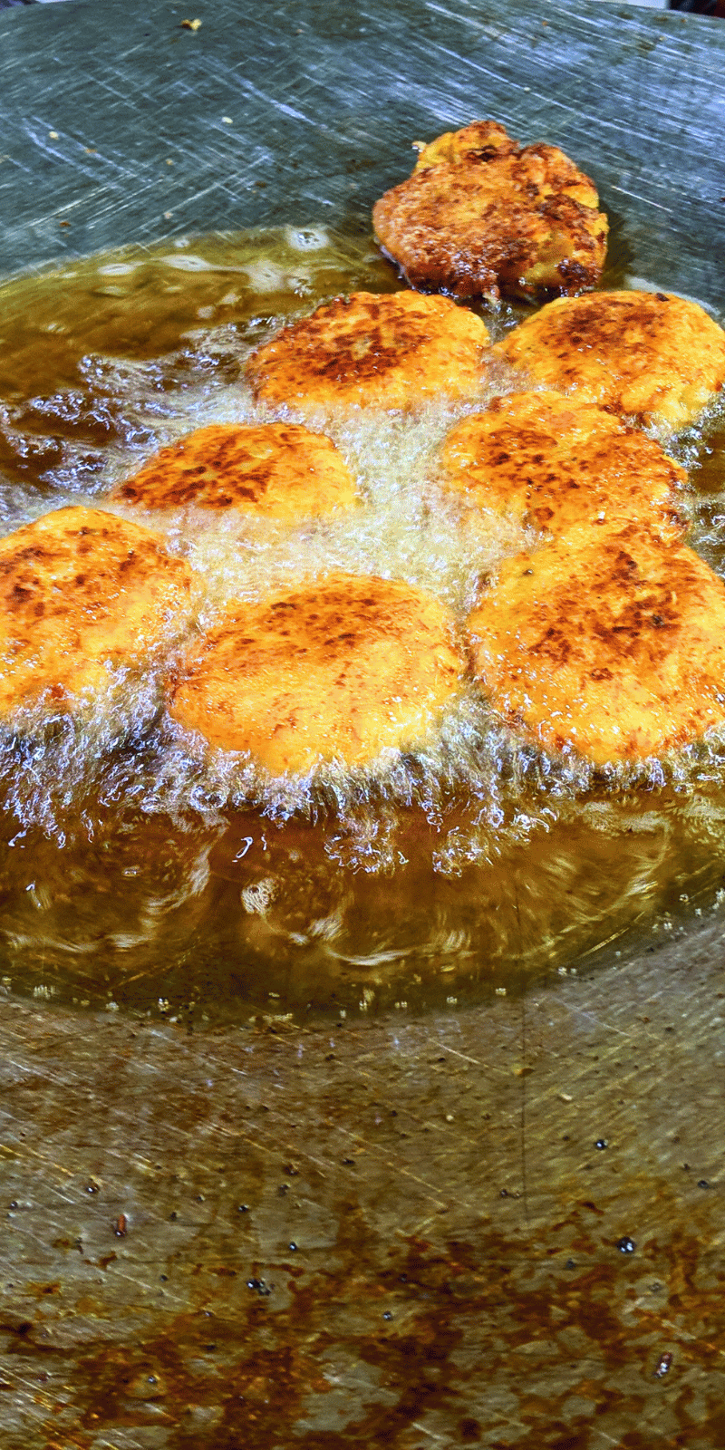 Frying aloo.