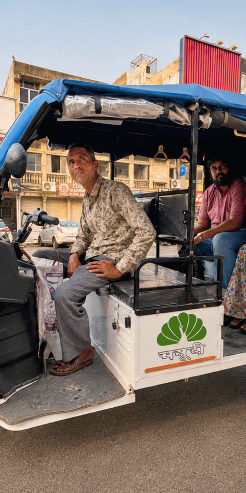 Electric rickshaw.