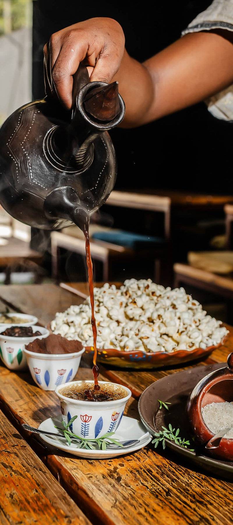 Pouring Ethiopian coffee.