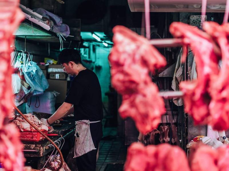 Wet market butcher.