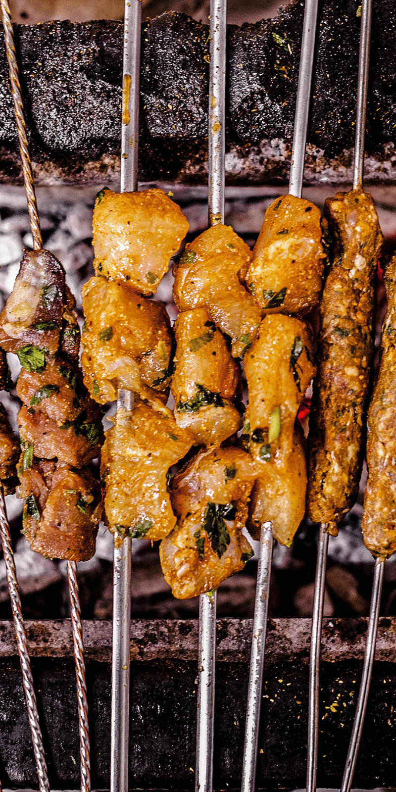 Skewers on charcoal.