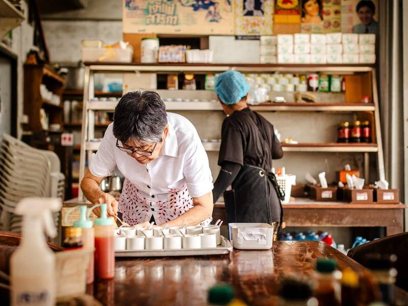 Shop vendor at work.