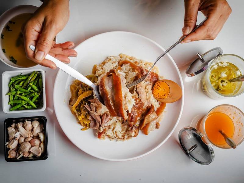Khao ka moo with pickled cabbage.