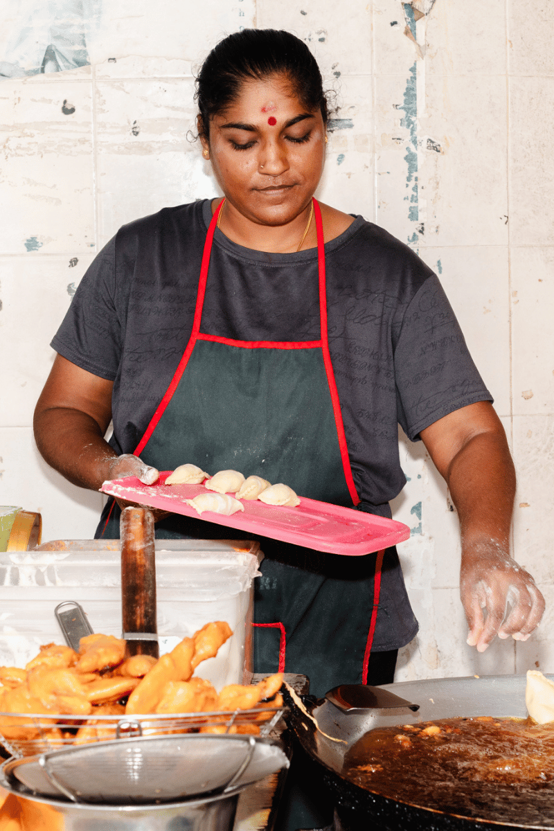 Samosas in the fryer.