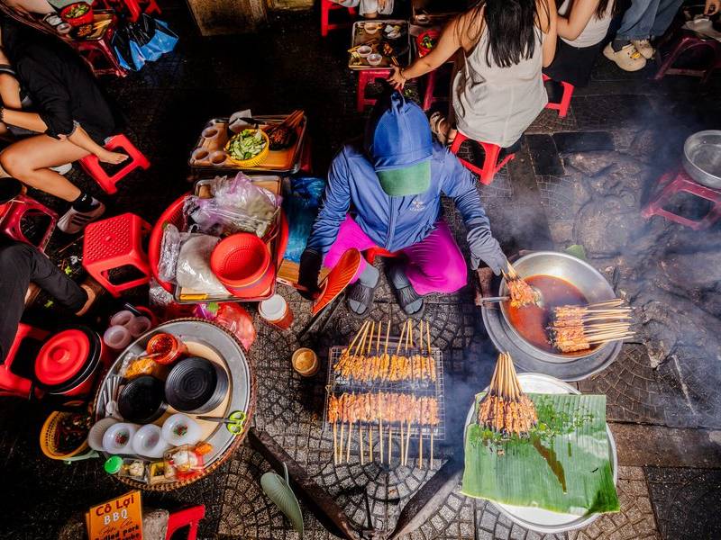 Cooking over charcoal.