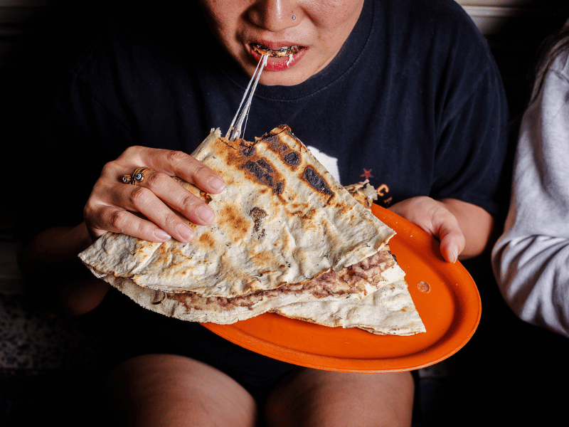 First bite of tlayuda.