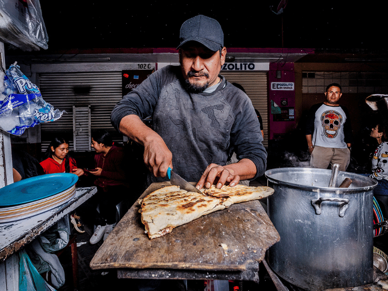 Slicing tlayudas.