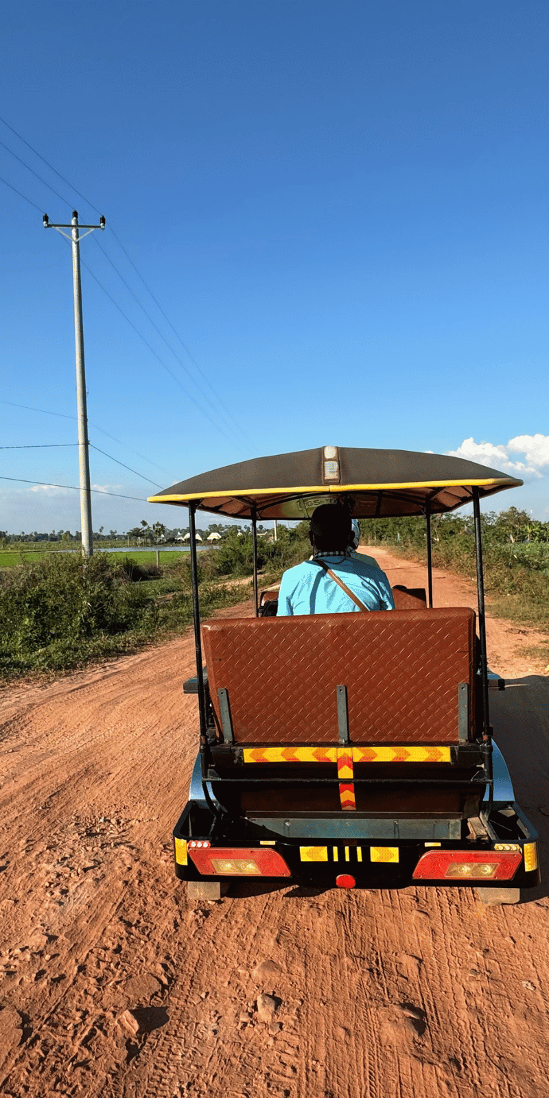 Tuk-tuk on dirt.