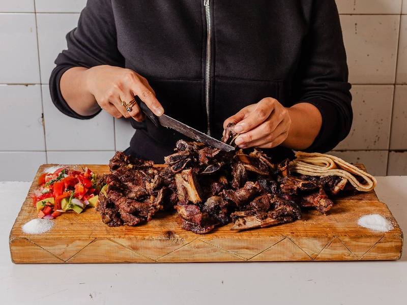 Chopping the ribs.