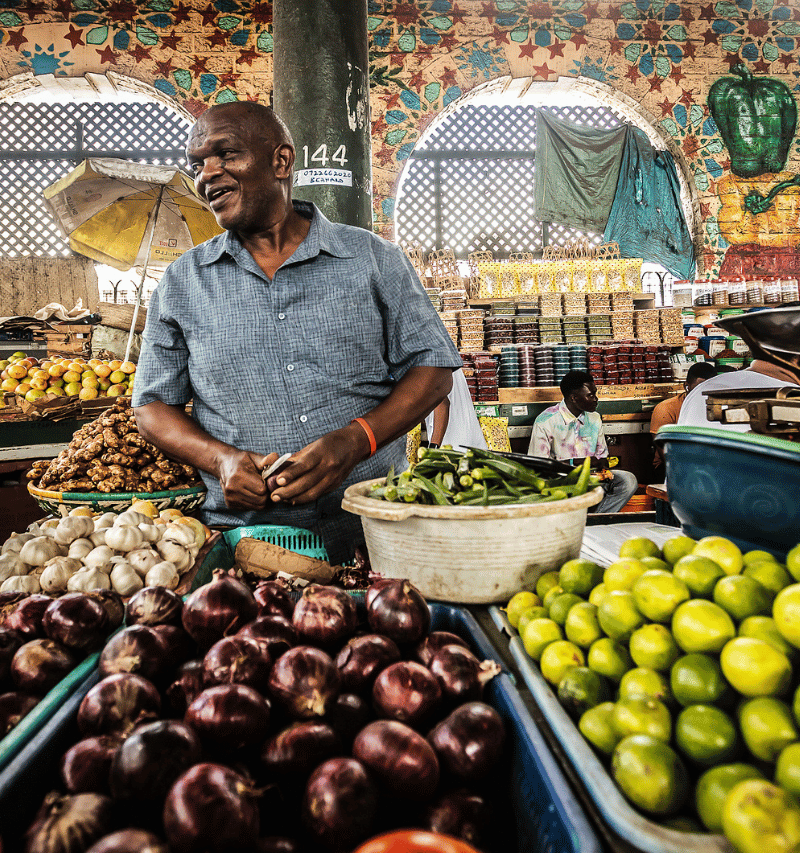 Uncle selling fruit.
