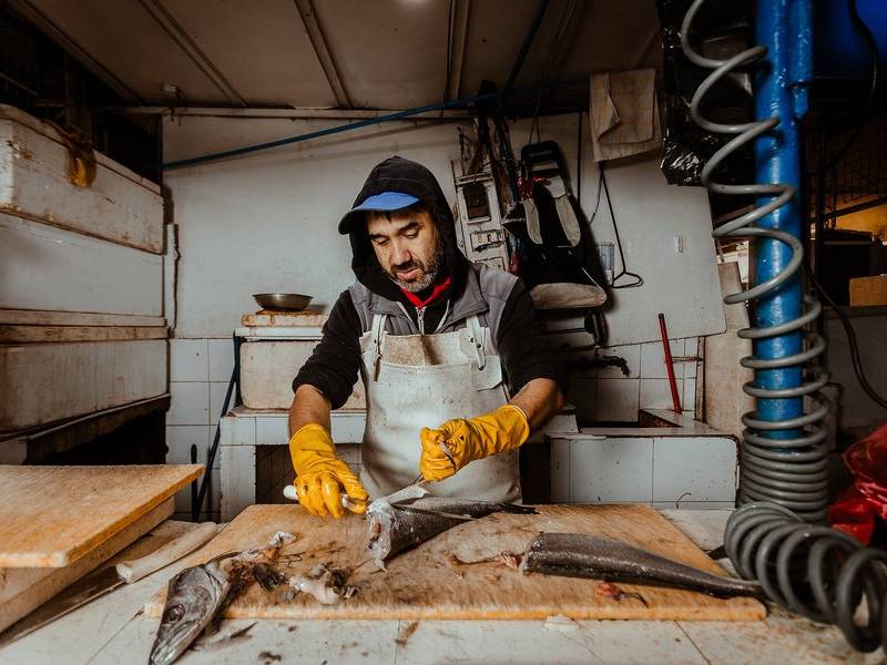 Gutting the fish.