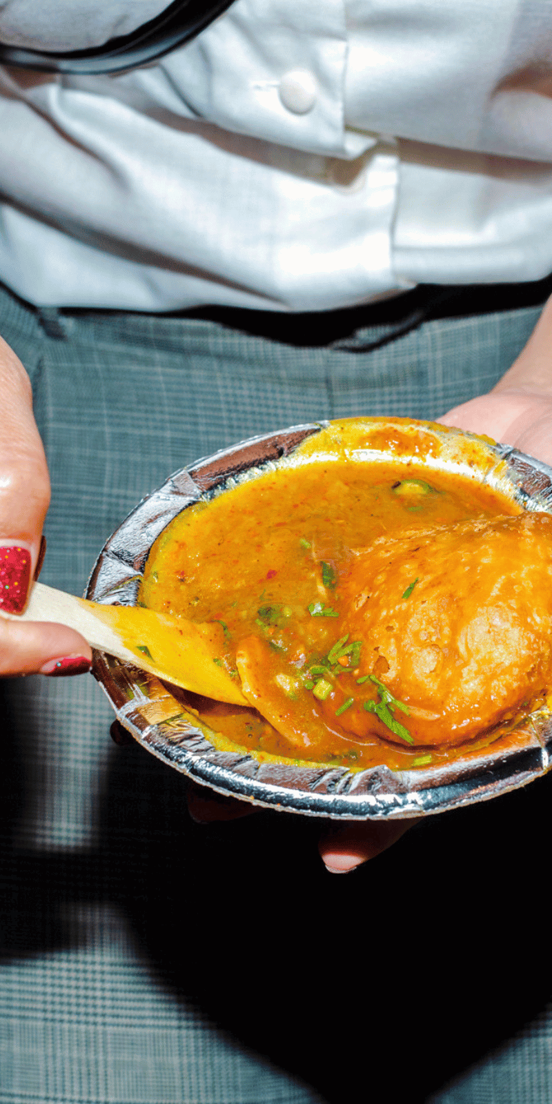 Lentil kachori with potato curry.