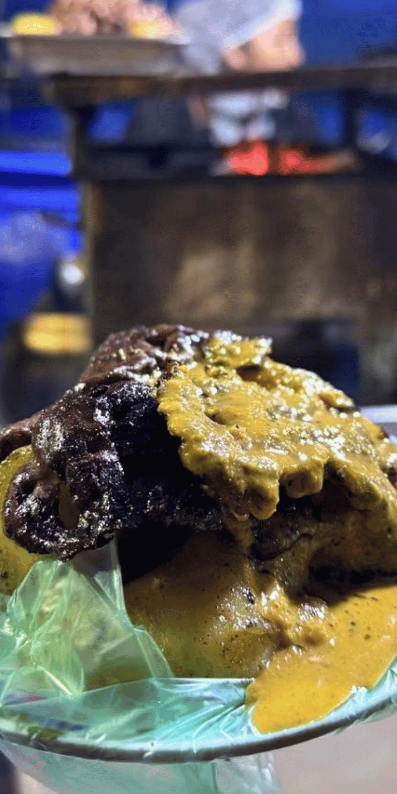Anticucho and peanut sauce.
