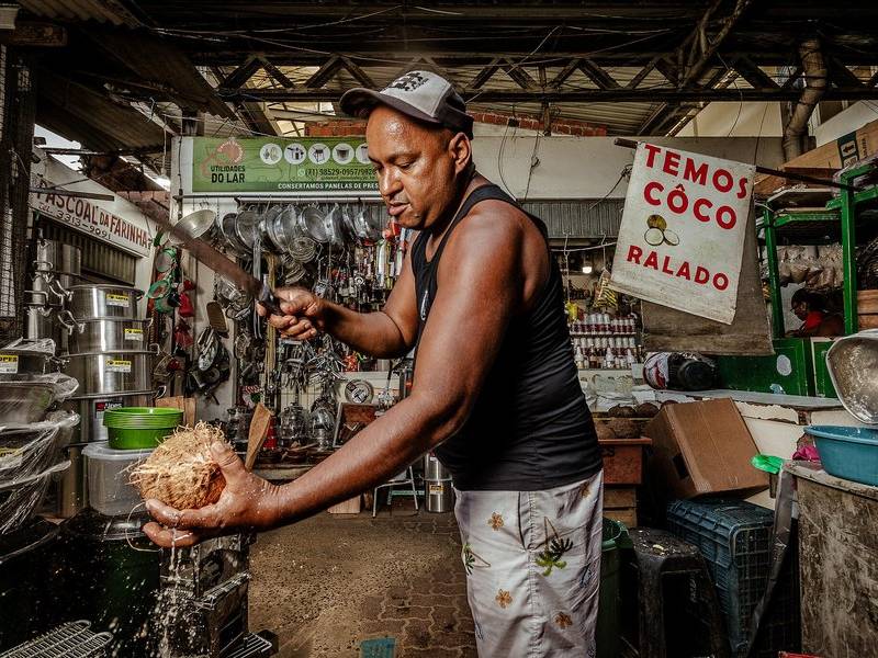 Cracking coconuts.
