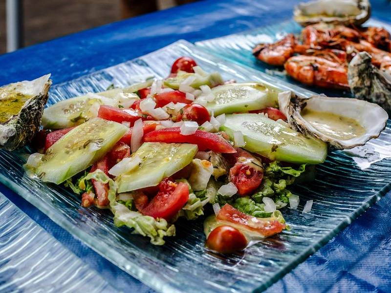 Oysters with chopped salad.