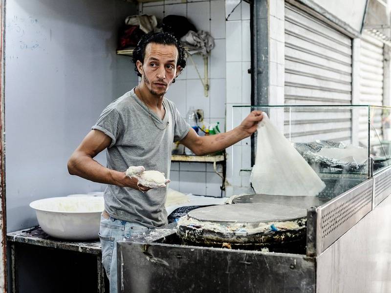 Making warqa pastry.